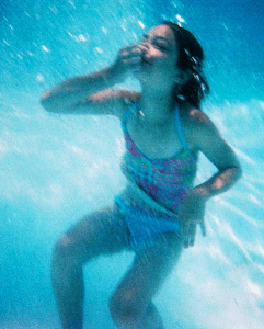 Child swimming under water