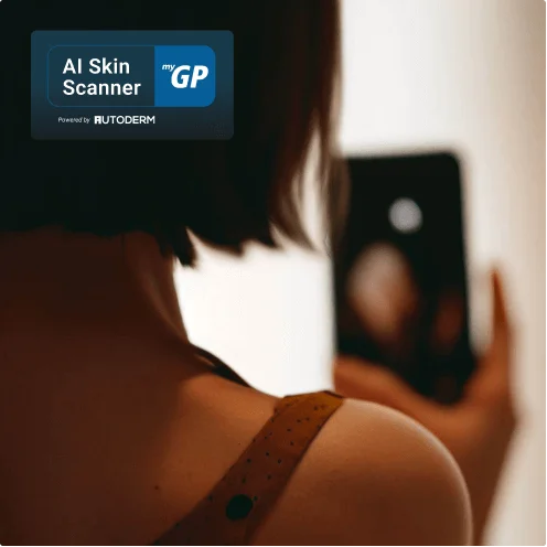 a woman using mygp app ai image scanner powered by autoderm technology to identify a skin ailment