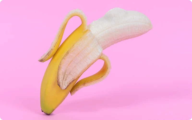 banana with a bump on the side suggesting the penis with a skin bump